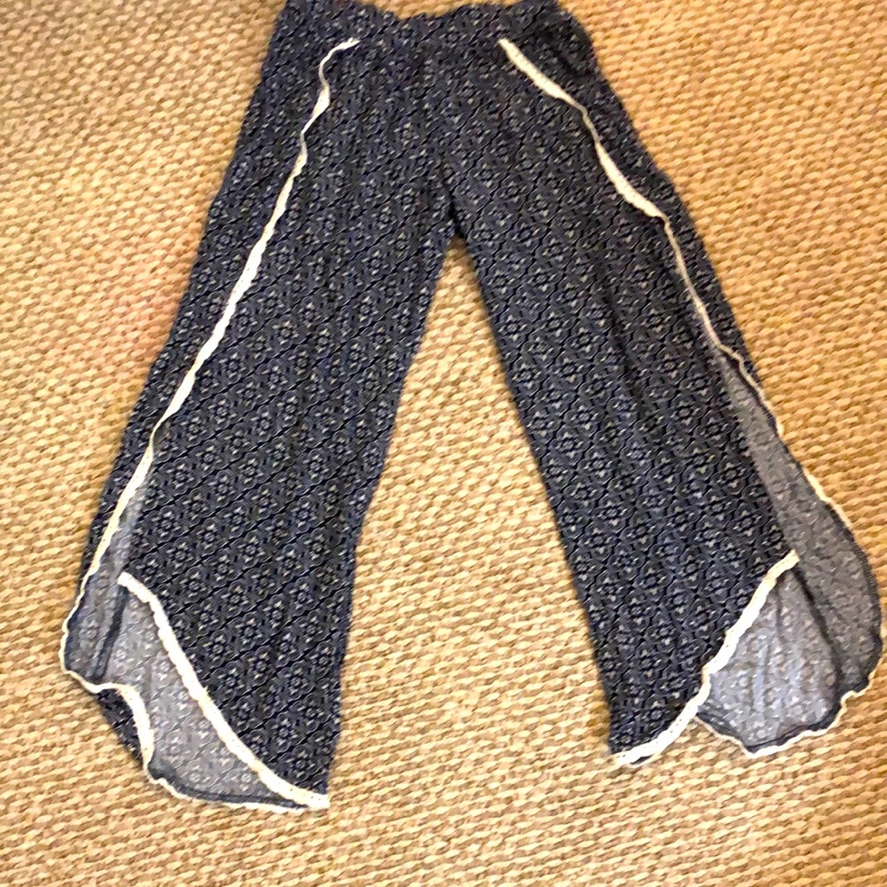 These are thin baggy pants and are a size Medium in girls